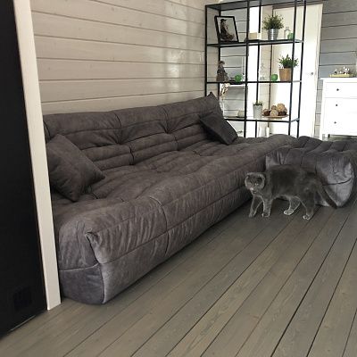 Пуф для ног к дивану: отзыв о дополнительном комфорте. Фото в интерьере. Рейтинг 5 звезд.