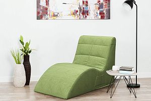 Кресло-лежак Велле зеленого цвета в гостиной